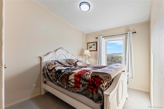 carpeted bedroom with a textured ceiling