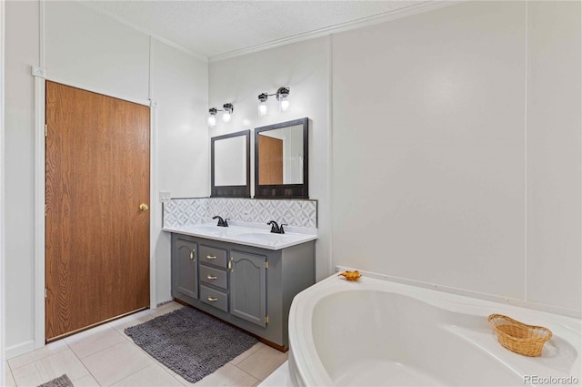 bathroom featuring a tub, tile patterned flooring, backsplash, crown molding, and vanity