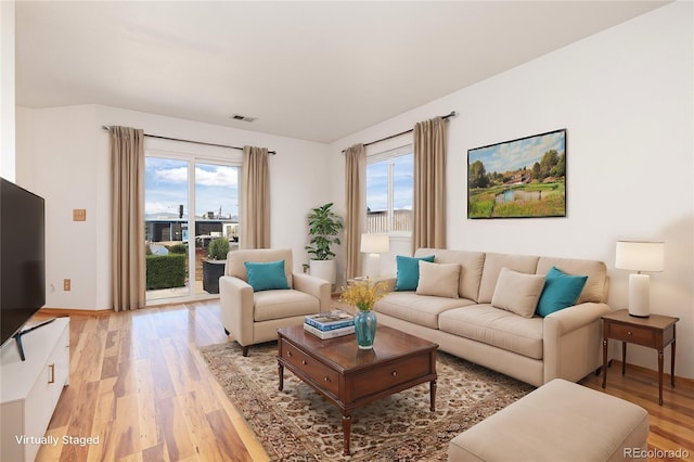 living room with hardwood / wood-style flooring