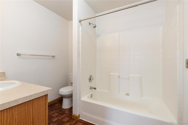 full bathroom with parquet flooring, vanity, shower / bath combination, and toilet