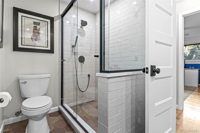 5465 W Ontario Ave, Littleton, CO 80128 - full bathroom featuring a tile shower and toilet