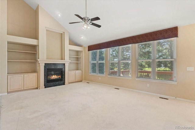 6449 S Jamaica Cir, Englewood, CO 80111 - unfurnished living room featuring ceiling fan, a tile fireplace, built in shelves, carpet, and recessed lighting