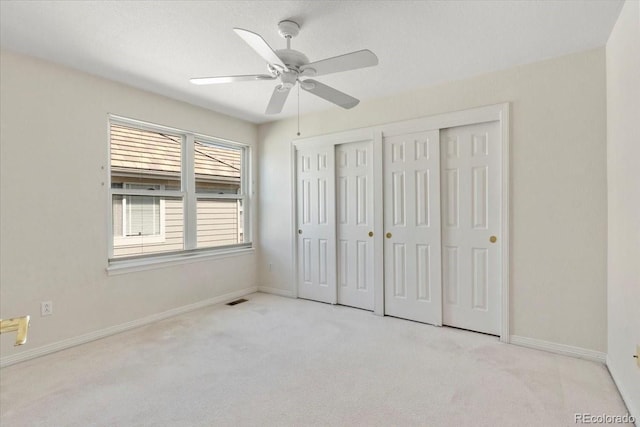 6449 S Jamaica Cir, Englewood, CO 80111 - unfurnished bedroom featuring carpet, a closet, and ceiling fan