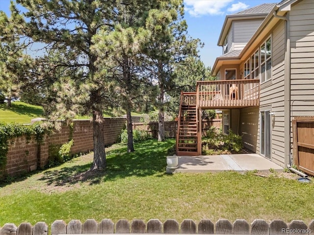 6449 S Jamaica Cir, Englewood, CO 80111 - fenced backyard featuring a deck and stairway