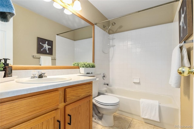 bathroom featuring shower / bathing tub combination, vanity, toilet, and tile patterned floors