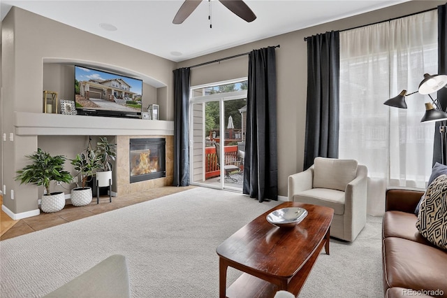 8378 Briar Trace Way, Castle Pines, CO 80108 - living area featuring ceiling fan, a fireplace, and tile patterned floors