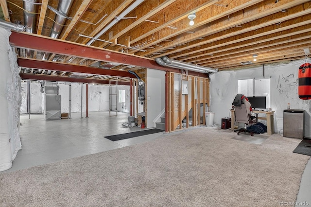 8378 Briar Trace Way, Castle Pines, CO 80108 - basement with heating unit, stairs, and a desk