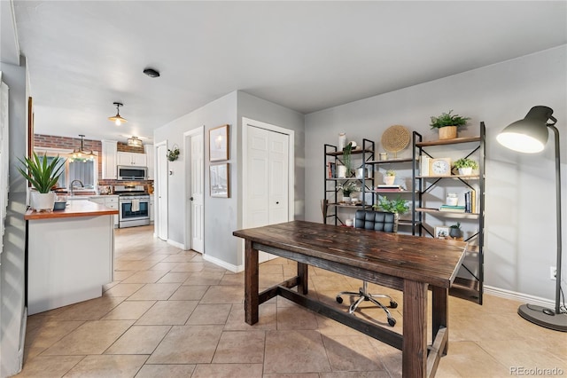 561 James St, Highlands Ranch, CO 80126 - office featuring light tile patterned flooring