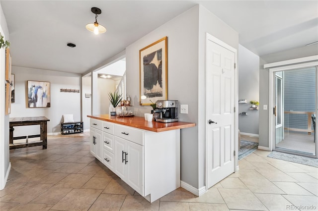 561 James St, Highlands Ranch, CO 80126 - hall featuring light tile patterned flooring and baseboards
