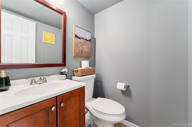561 James St, Highlands Ranch, CO 80126 - half bathroom featuring vanity and toilet