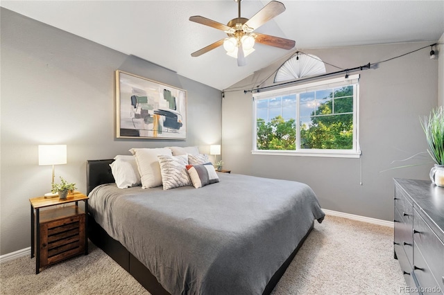 561 James St, Highlands Ranch, CO 80126 - bedroom featuring light colored carpet, lofted ceiling, and ceiling fan