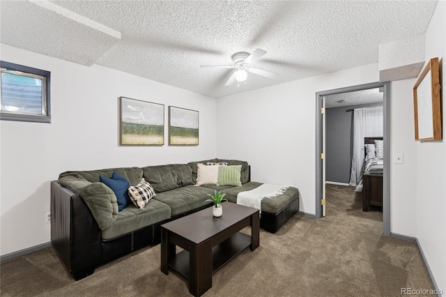 561 James St, Highlands Ranch, CO 80126 - living room featuring ceiling fan, carpet floors, and a textured ceiling