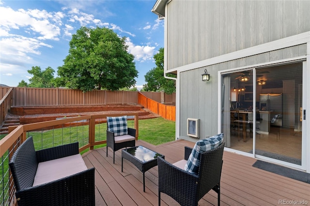 561 James St, Highlands Ranch, CO 80126 - deck with a fenced backyard and an outdoor living space
