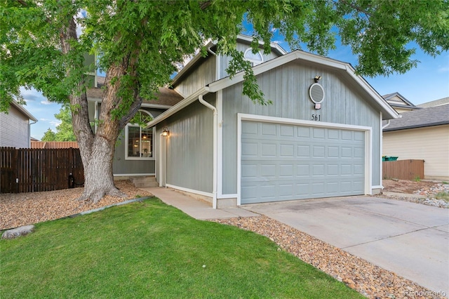 561 James St, Highlands Ranch, CO 80126 - view of front of home with a garage and driveway