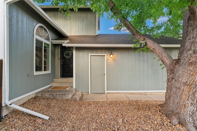 561 James St, Highlands Ranch, CO 80126 - view of exterior entry featuring roof with shingles