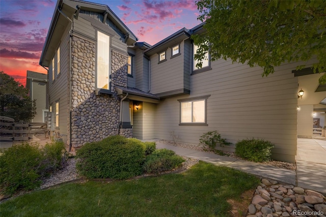 view of front of property featuring stone siding