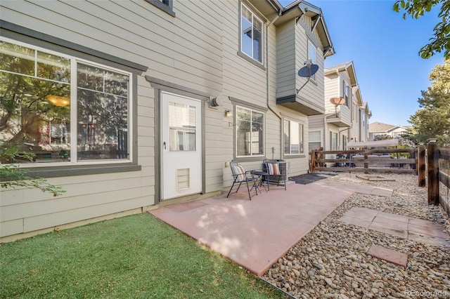 view of patio featuring fence