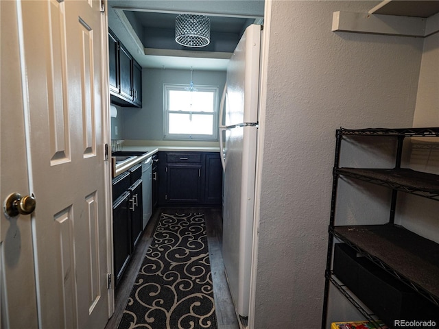 kitchen with dishwasher and white refrigerator