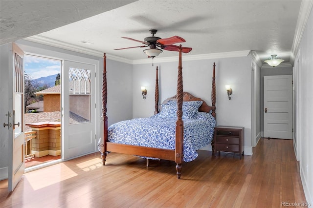 2006 N Cascade Ave, Colorado Springs, CO 80907 - bedroom with baseboards, ornamental molding, hardwood / wood-style flooring, and access to exterior