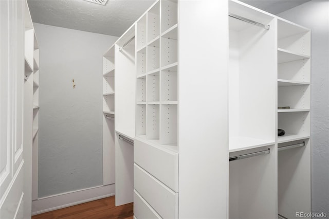 2006 N Cascade Ave, Colorado Springs, CO 80907 - spacious closet featuring dark wood-style flooring