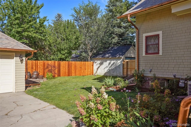 2006 N Cascade Ave, Colorado Springs, CO 80907 - view of yard with fence, a storage unit, and an outbuilding