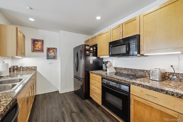 300 W 11th Ave Unit 15C, Denver, CO 80204 - kitchen featuring black appliances, light brown cabinetry, dark wood-style floors, a sink, and dark countertops