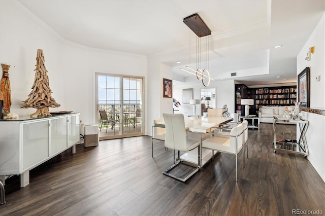 300 W 11th Ave Unit 15C, Denver, CO 80204 - dining space with wood finished floors and crown molding