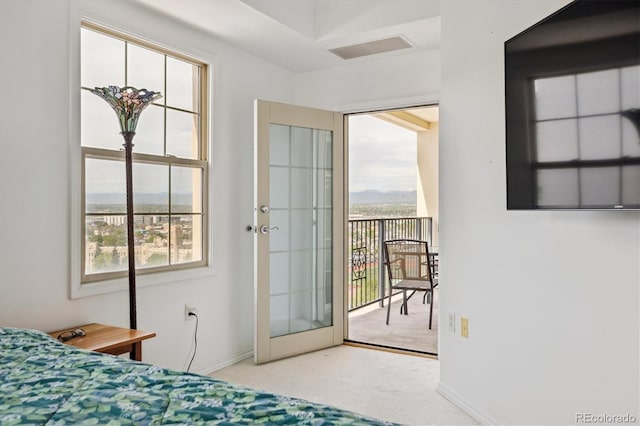 300 W 11th Ave Unit 15C, Denver, CO 80204 - bedroom with access to exterior, carpet floors, and baseboards