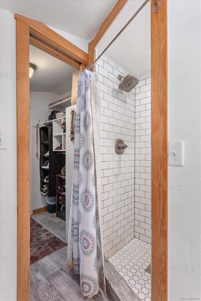 18680 Wapiti Cir, Buena Vista, CO 81211 - full bathroom featuring a shower stall and wood finished floors