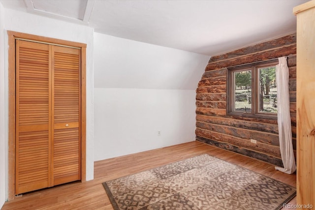 18680 Wapiti Cir, Buena Vista, CO 81211 - bonus room featuring wood finished floors and vaulted ceiling