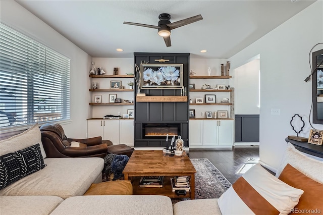 21038 E Quincy Pl, Aurora, CO 80015 - living area with a ceiling fan, dark wood-style floors, and a large fireplace