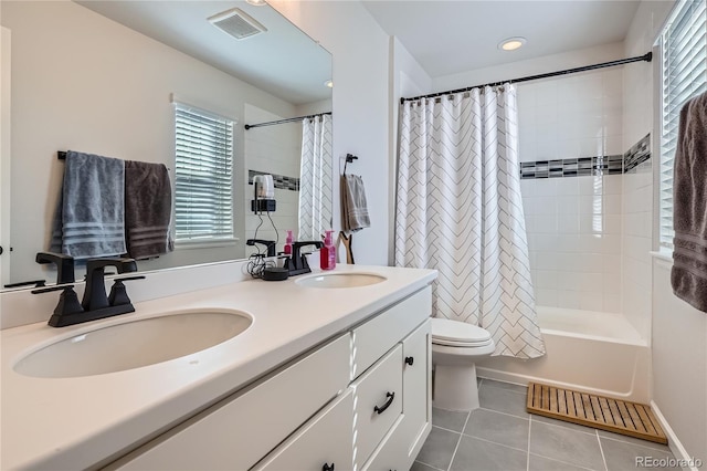 21038 E Quincy Pl, Aurora, CO 80015 - bathroom with tile patterned floors, double vanity, and shower / bath combo with shower curtain