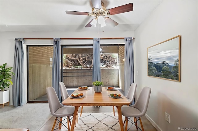 15202 E Hampden Cir Unit F2, Aurora, CO 80014 - dining area with a ceiling fan and baseboards