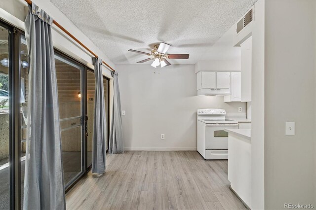 15202 E Hampden Cir Unit F2, Aurora, CO 80014 - kitchen featuring white electric range, under cabinet range hood, ceiling fan, light wood finished floors, and white cabinets
