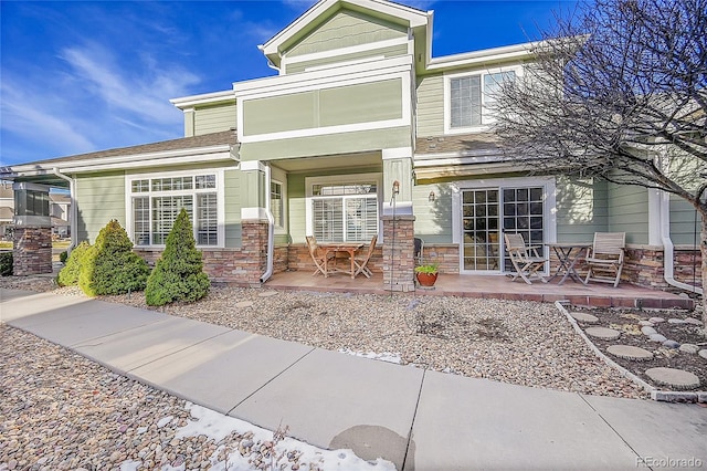 view of front of house with a patio