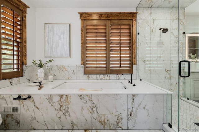 1332 S Lafayette St, Denver, CO 80210 - bathroom featuring a marble finish shower and a bath