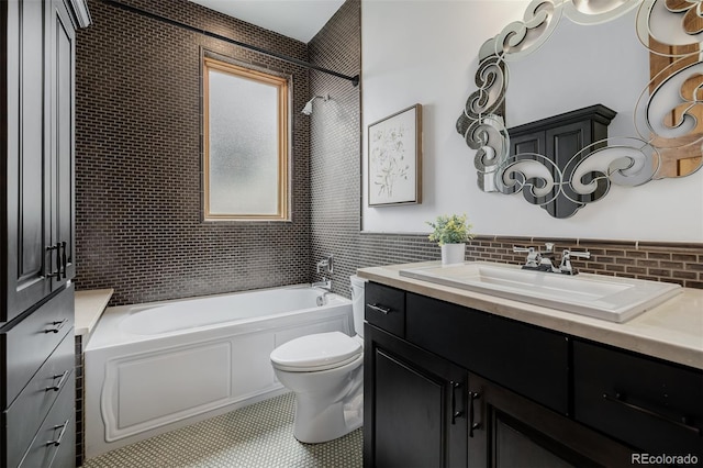 1332 S Lafayette St, Denver, CO 80210 - bathroom with vanity, toilet, and tile walls