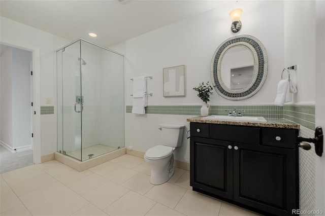 1332 S Lafayette St, Denver, CO 80210 - full bathroom featuring toilet, a shower stall, vanity, and tile patterned flooring