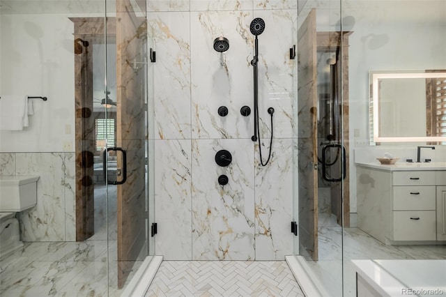 1332 S Lafayette St, Denver, CO 80210 - full bath with vanity, a marble finish shower, and tile walls
