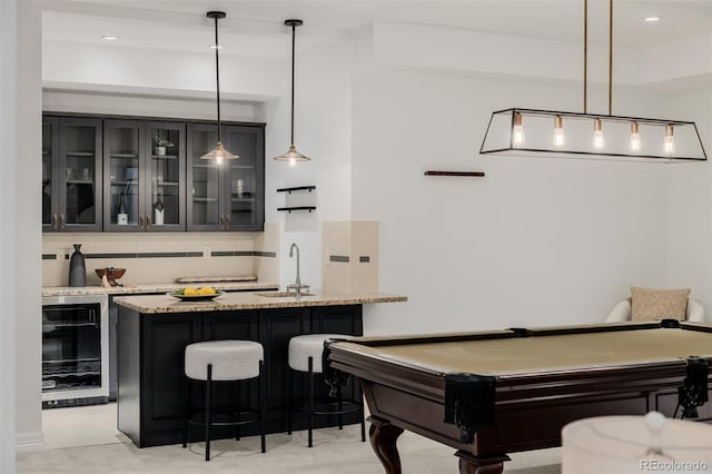 1332 S Lafayette St, Denver, CO 80210 - indoor wet bar featuring wine cooler, billiards table, decorative light fixtures, and recessed lighting