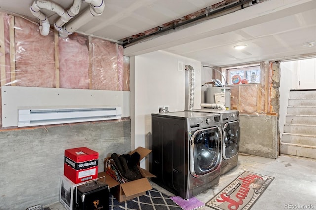 washroom featuring separate washer and dryer, a baseboard radiator, and water heater