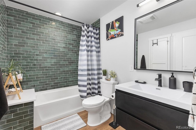 full bathroom with toilet, vanity, wood-type flooring, and shower / bathtub combination with curtain