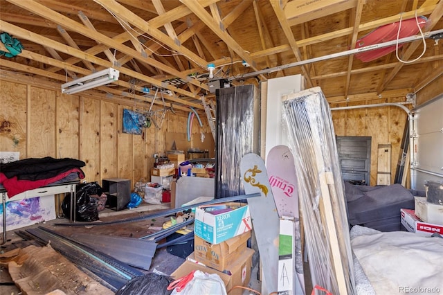 garage featuring wooden walls