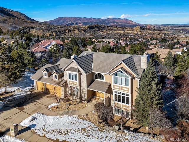 drone / aerial view featuring a mountain view