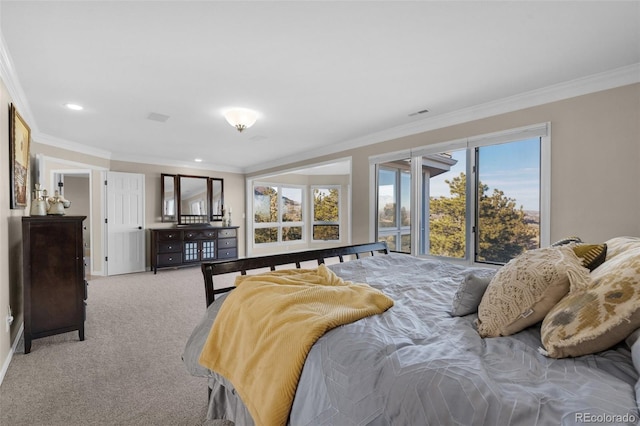 carpeted bedroom with ornamental molding