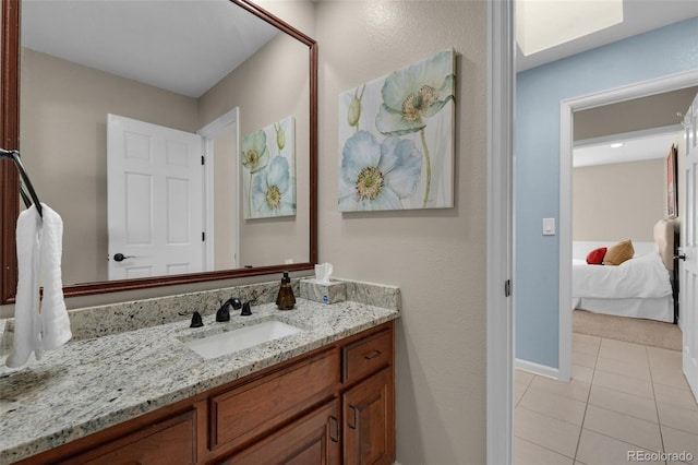 bathroom featuring vanity and tile patterned flooring