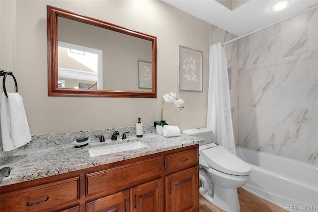 full bathroom with vanity, toilet, wood-type flooring, and shower / bath combo with shower curtain