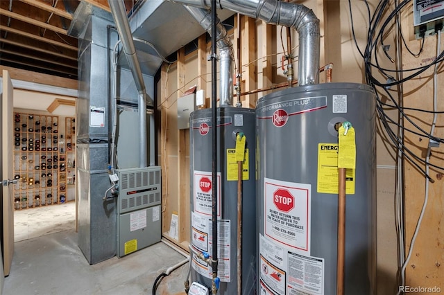 utility room featuring water heater