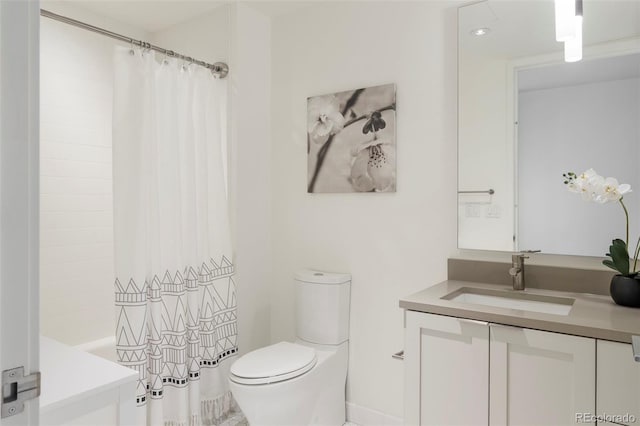 1750 Wewatta St Unit 809, Denver, CO 80202 - bathroom featuring toilet, vanity, and shower / bath combination with curtain