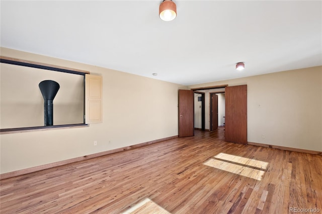 empty room featuring light hardwood / wood-style floors